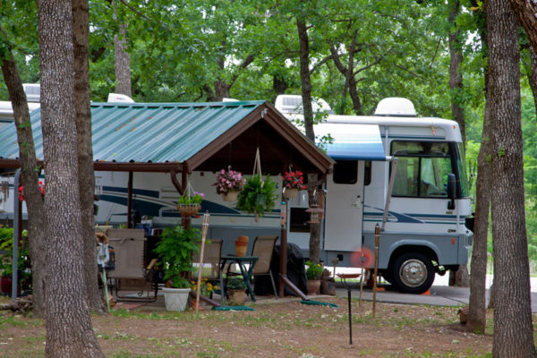 rv site on paved pad with many decorations