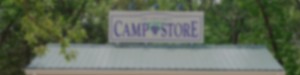 camp store sign, with blurred effect