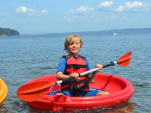 Boy in paddle boat