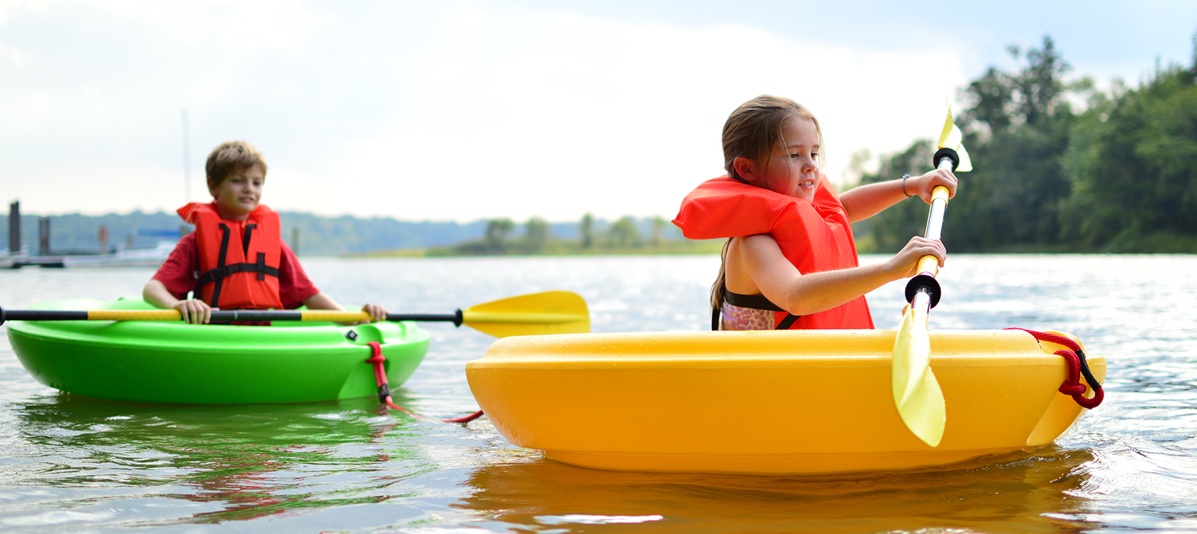 Kids in paddling boats
